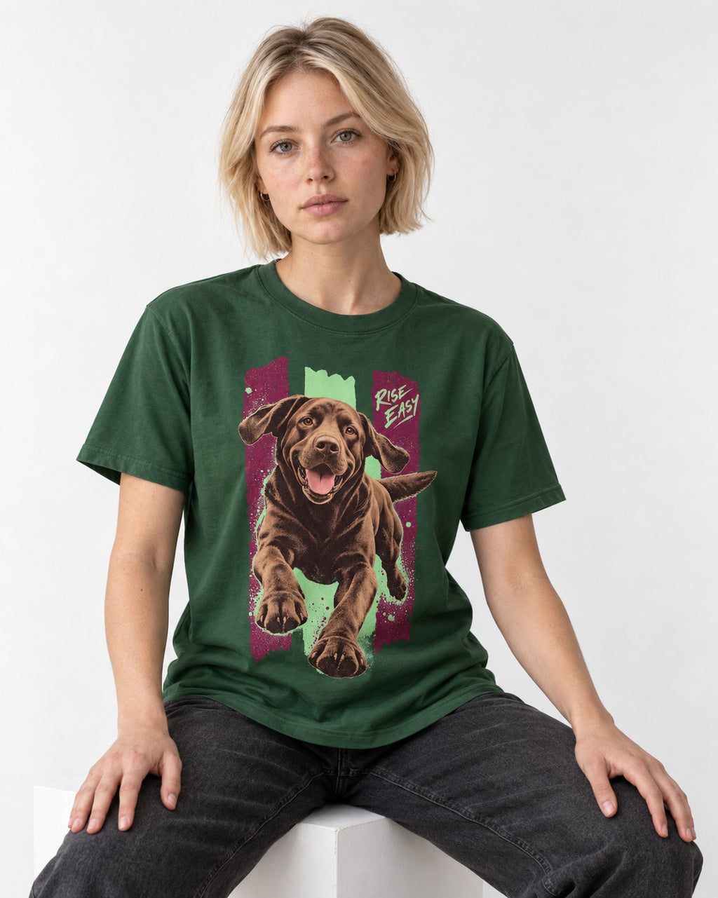 Labrador Retriever Rise Easy Running Chocolate Lab Graphic T-Shirt in Forest Green, worn by a seated model