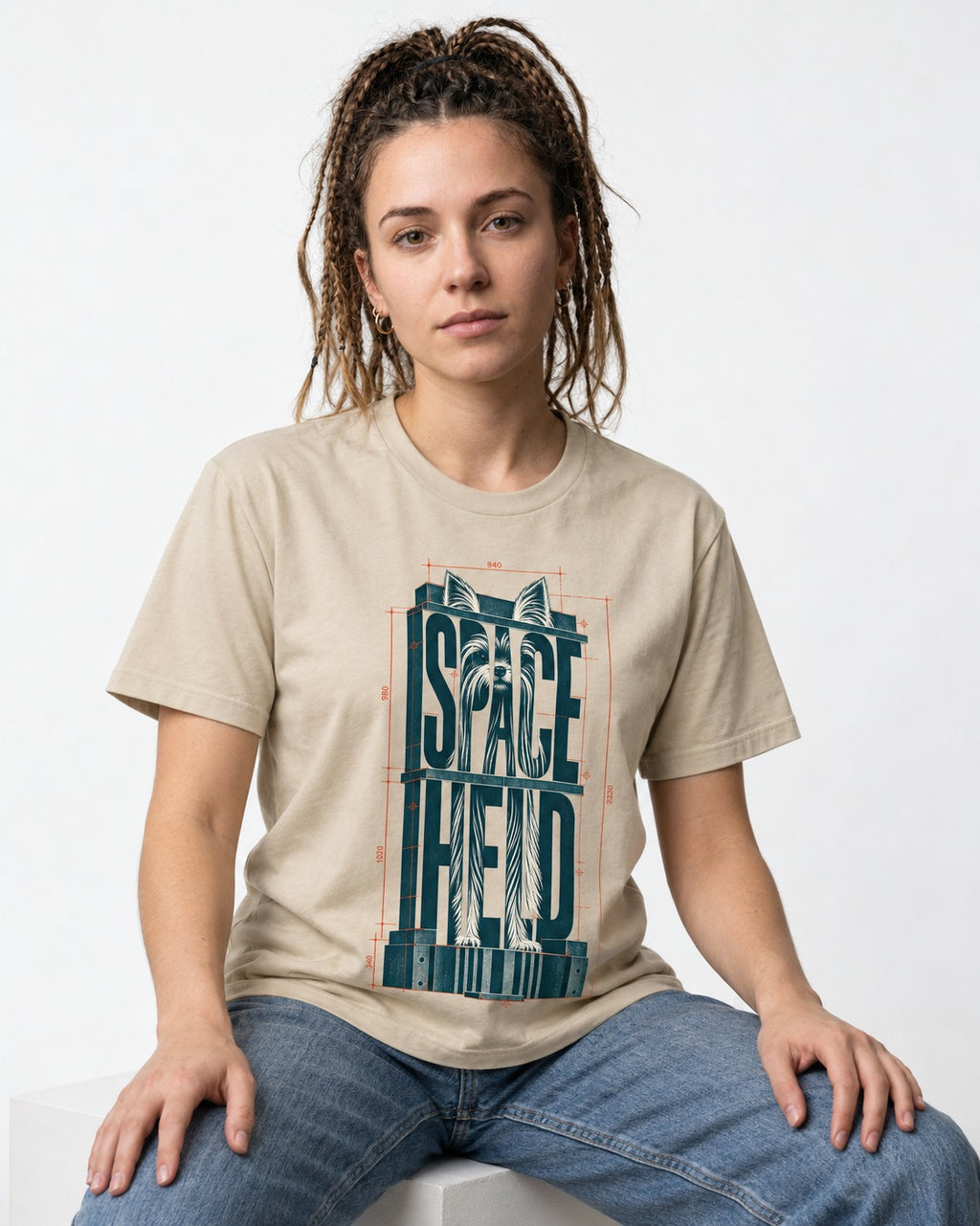 Yorkshire Terrier Space Head T-Shirt in Sand, worn by a seated model