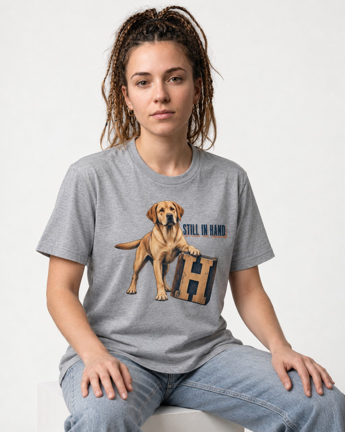 Labrador Retriever Still in Hand T-Shirt in Sport Grey, worn by a seated model
