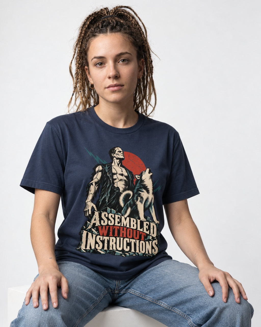 Husky Assembled Without Instructions Frankenstein Graphic T-Shirt in Navy, worn by a seated model