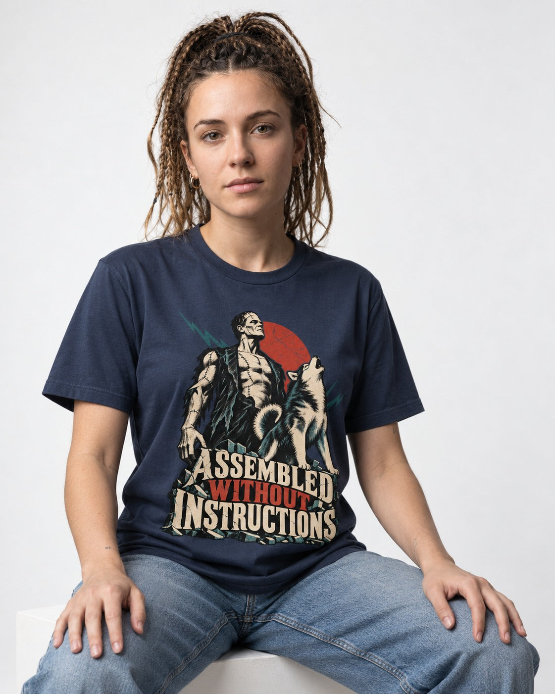 Husky Assembled Without Instructions Frankenstein Graphic T-Shirt in Navy, worn by a seated model
