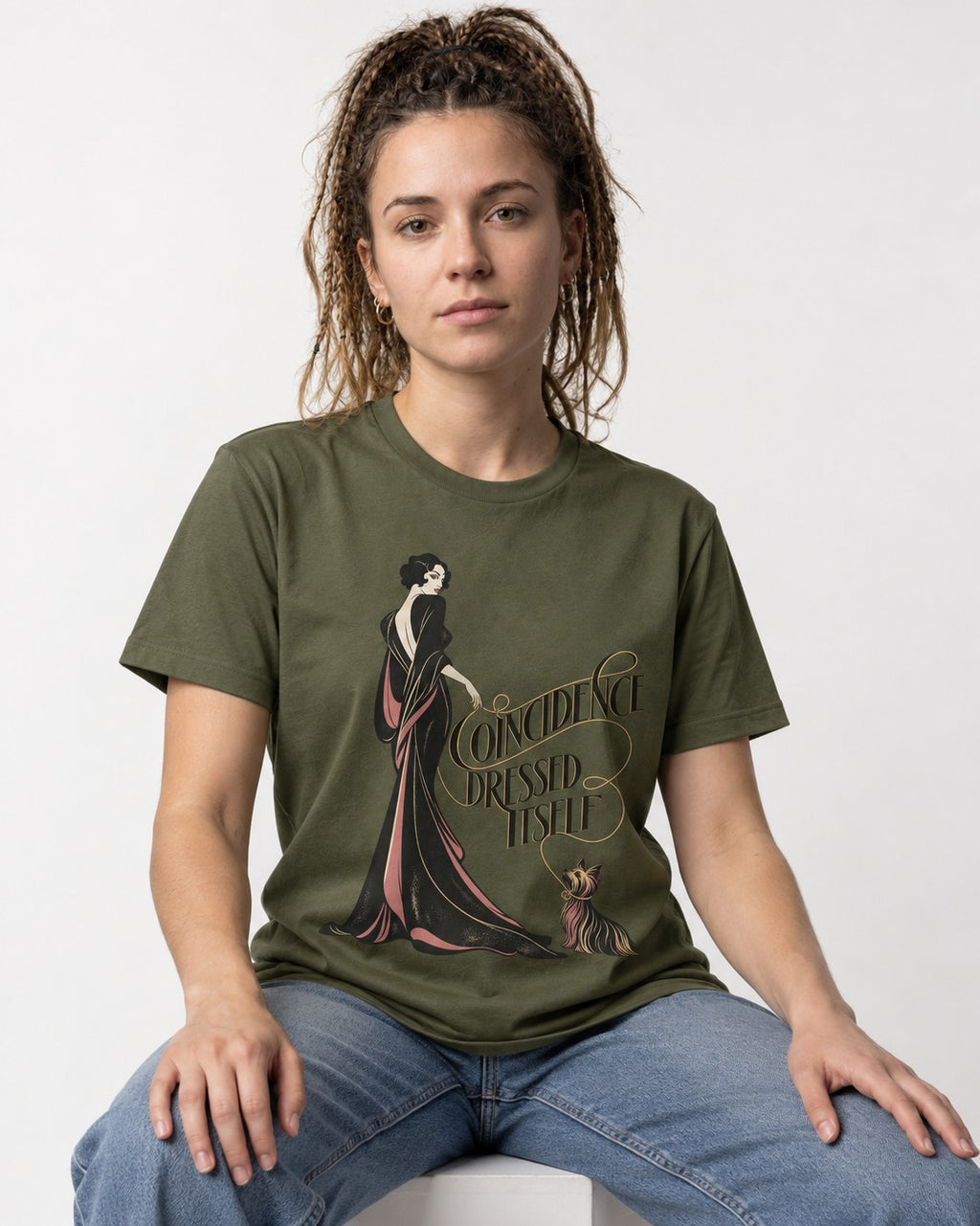 Yorkshire Terrier Coincidence Dressed Itself Art Deco Graphic T-Shirt in Heather Military Green, worn by a seated model