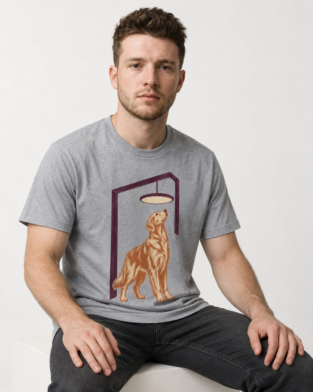 Golden Retriever Bright Idea T-Shirt in Sport Grey, worn by a seated model