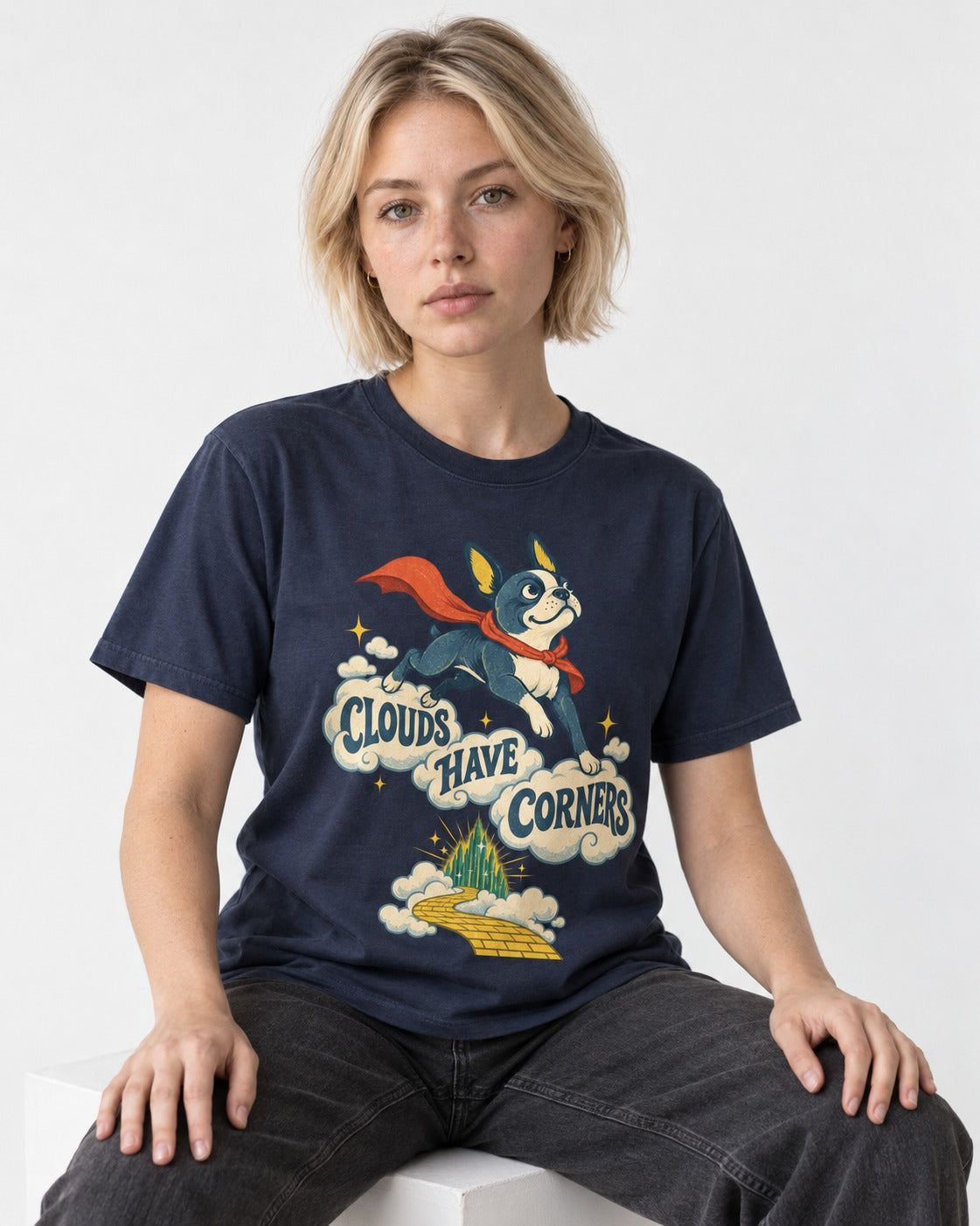 Clouds Have Corners Boston Terrier T-Shirt in Navy, worn by a seated model