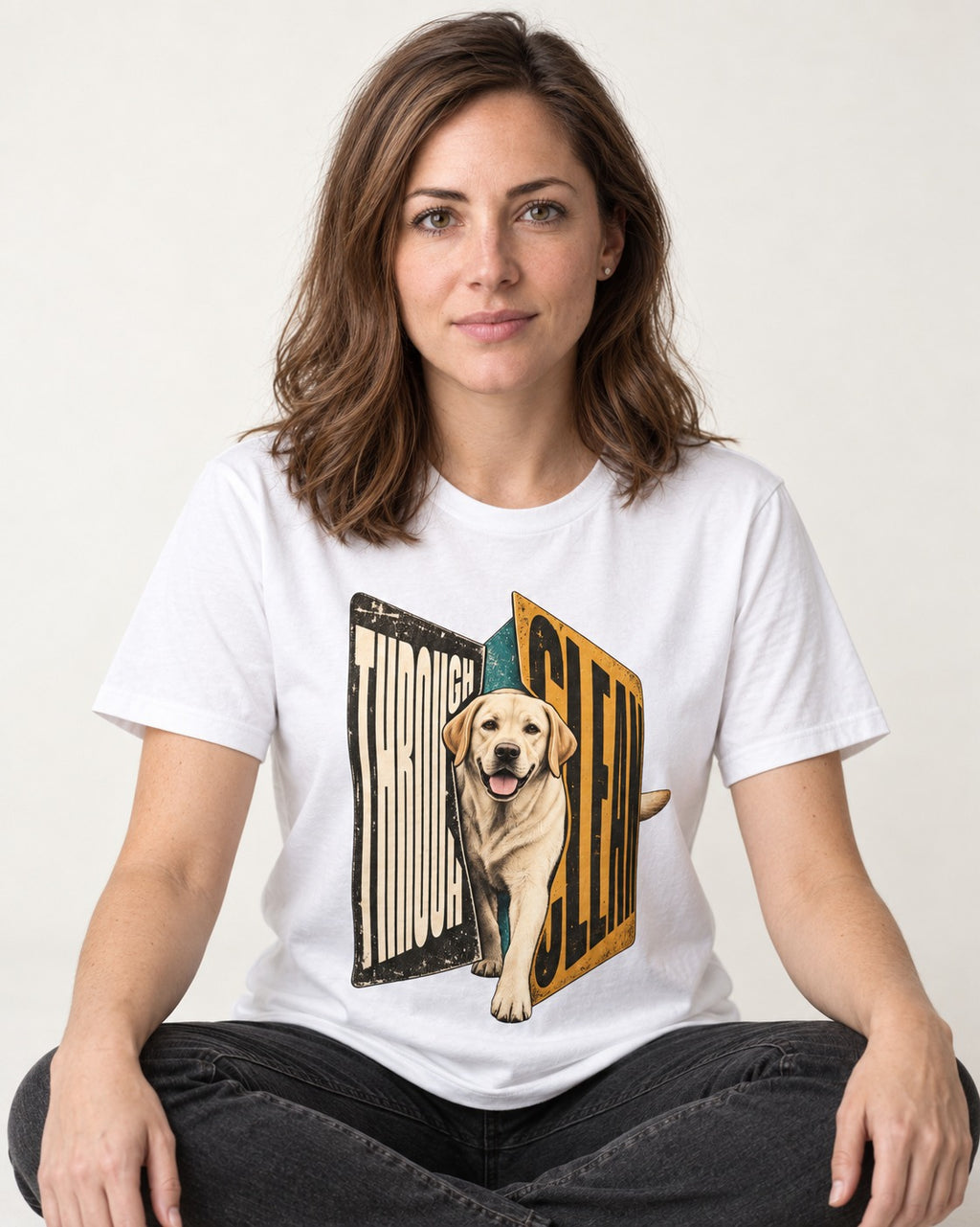 Labrador Retriever Through Steel Split Sign Graphic T-Shirt in White, worn by a seated model