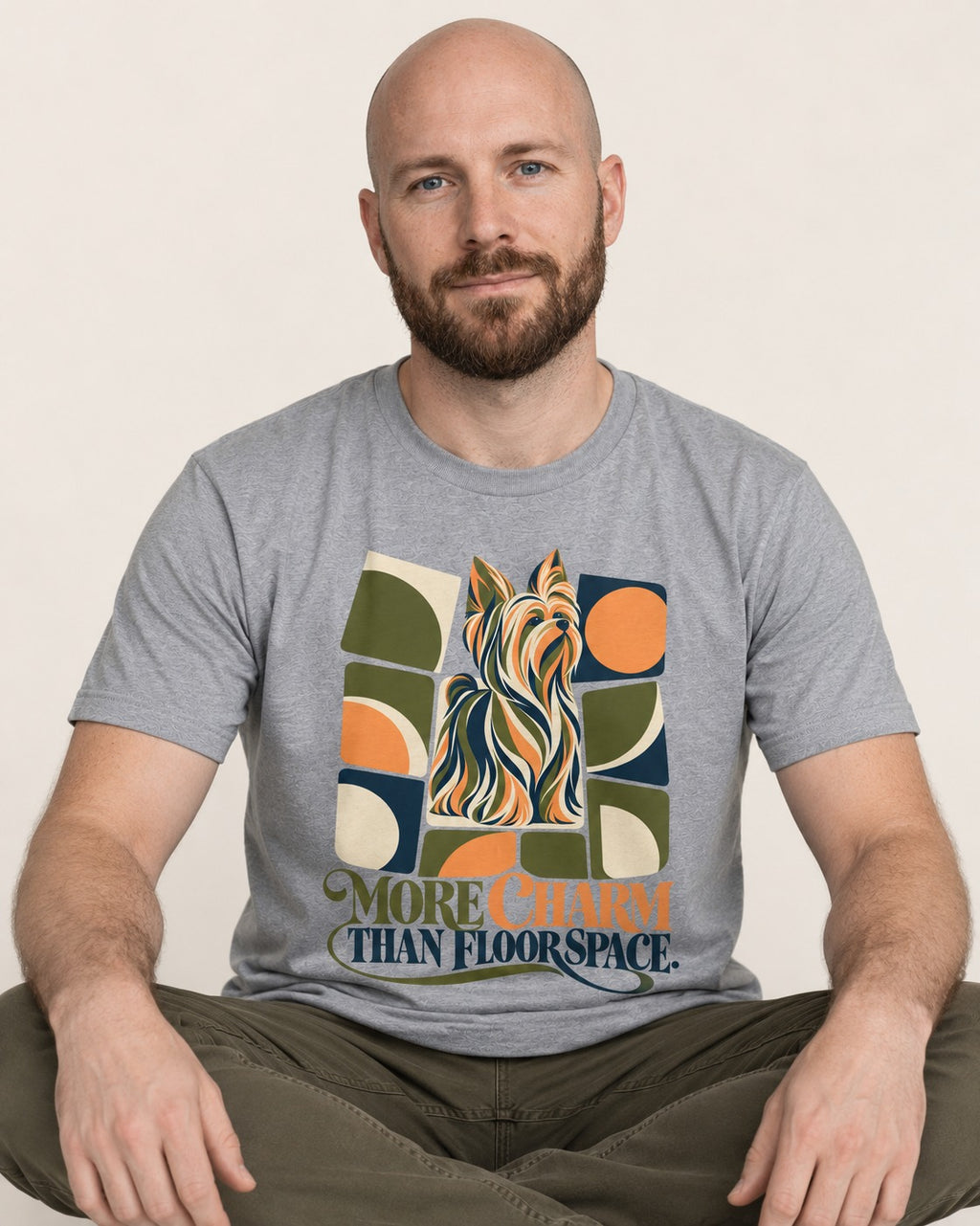 Yorkshire Terrier More Charm Than Space T-Shirt in Sport Grey, worn by a seated model