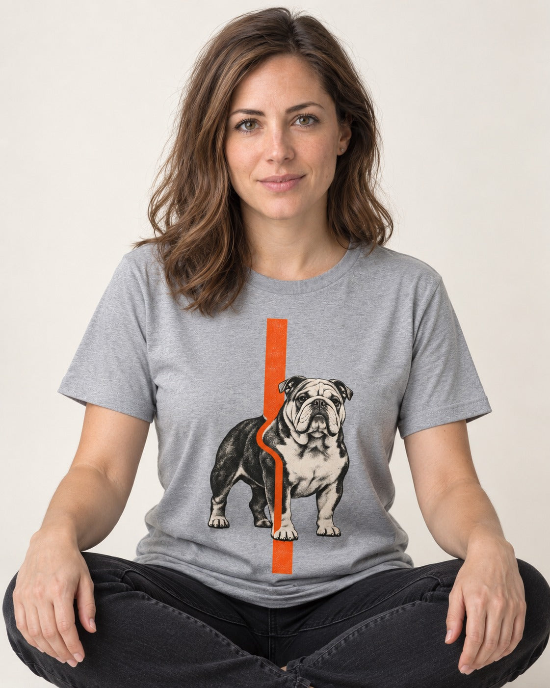 English Bulldog Quiet Strength T-Shirt in Sport Grey, worn by a seated model