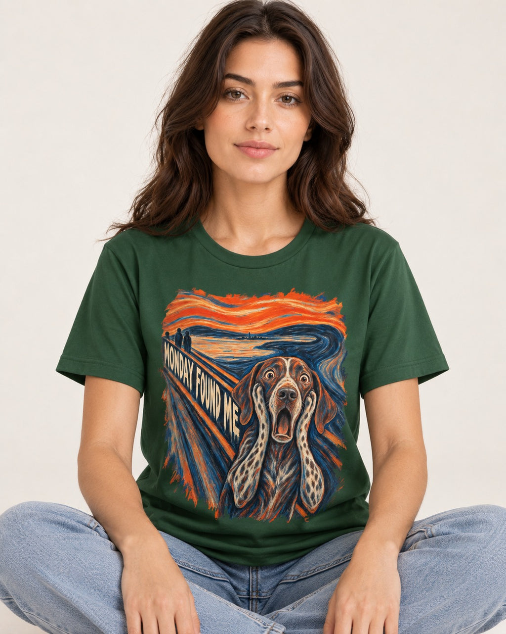 German Shorthaired Pointer Monday Found Me Scream Parody Graphic T-Shirt in Forest Green, worn by a seated model