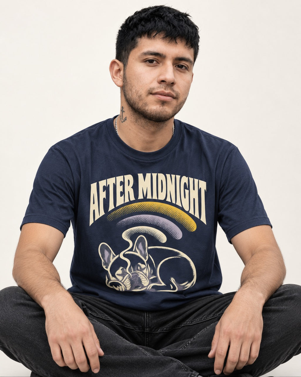 Frenchie After Midnight Sleeping Graphic T-Shirt in Navy, worn by a seated model