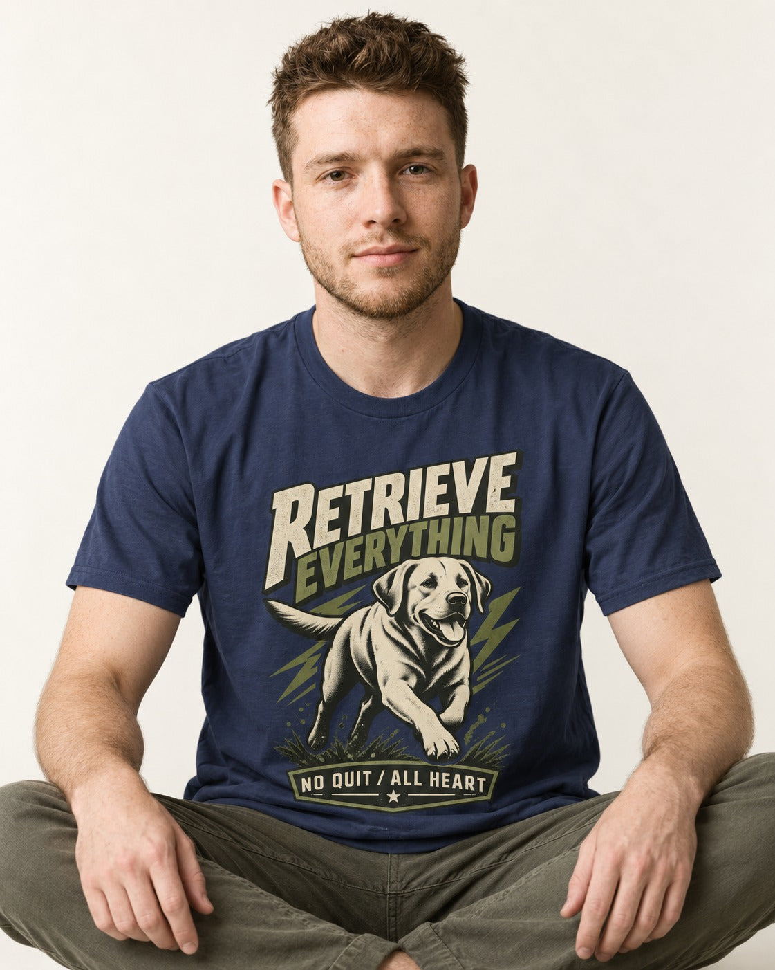Labrador Retriever Retrieve Everything No Quit All Heart Running Graphic T-Shirt in Navy, worn by a seated model