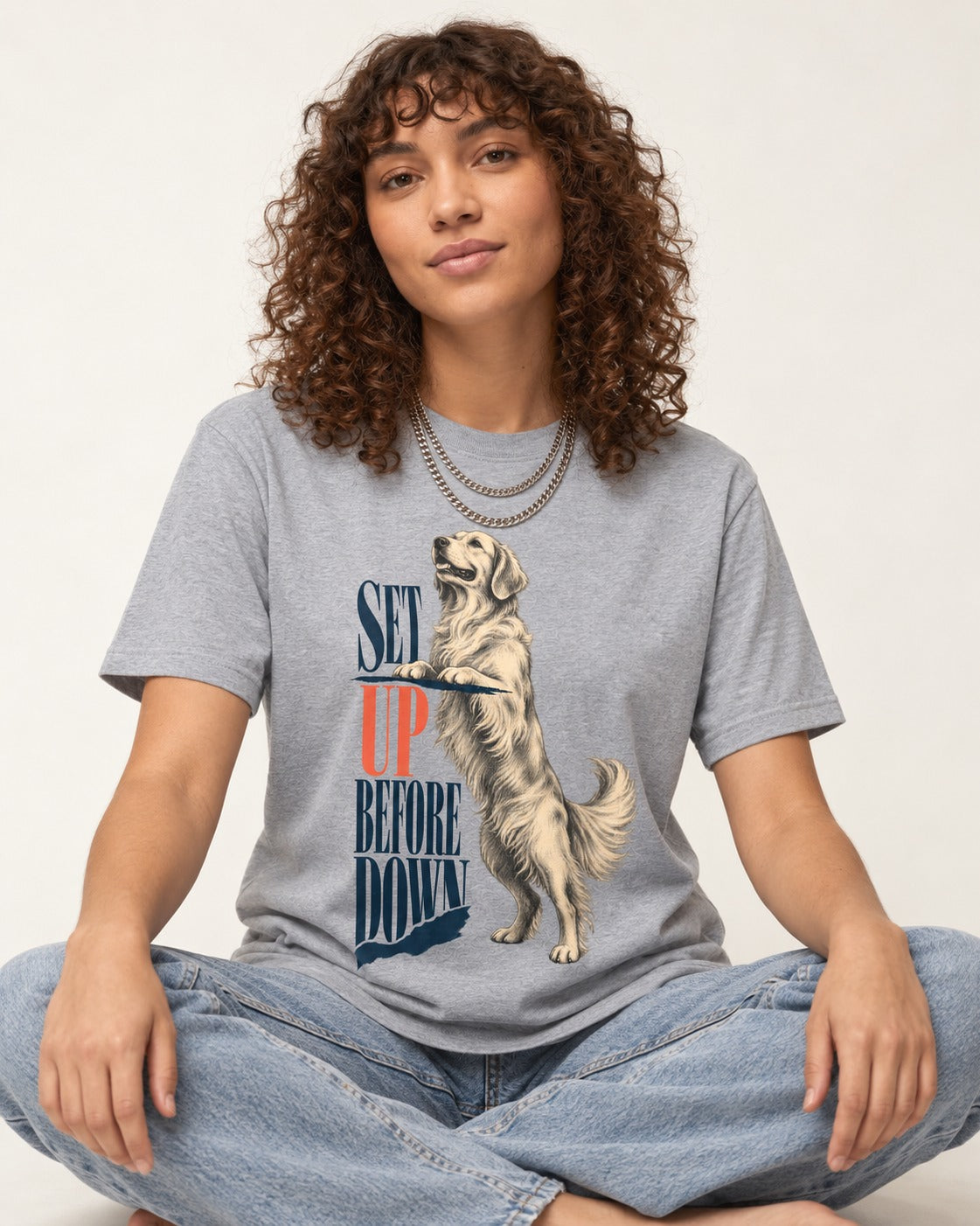 Golden Retriever Set Up Before Down T-Shirt in Sport Grey, worn by a seated model