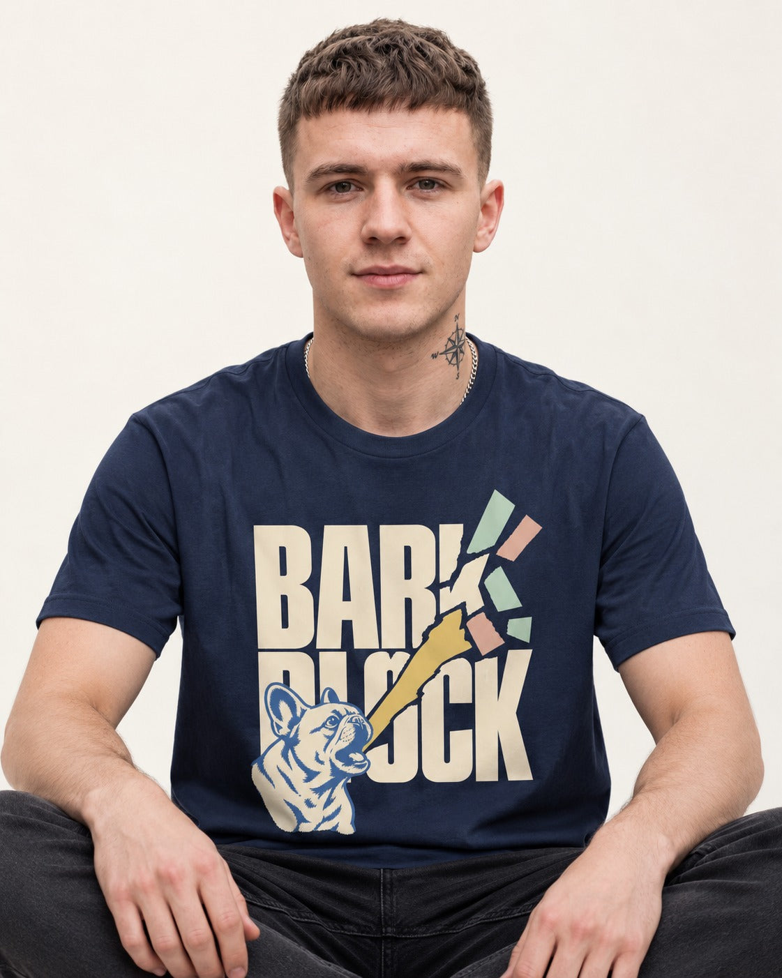 Frenchie Bark Breaks Bark Block Graphic T-Shirt in Navy, worn by a seated model
