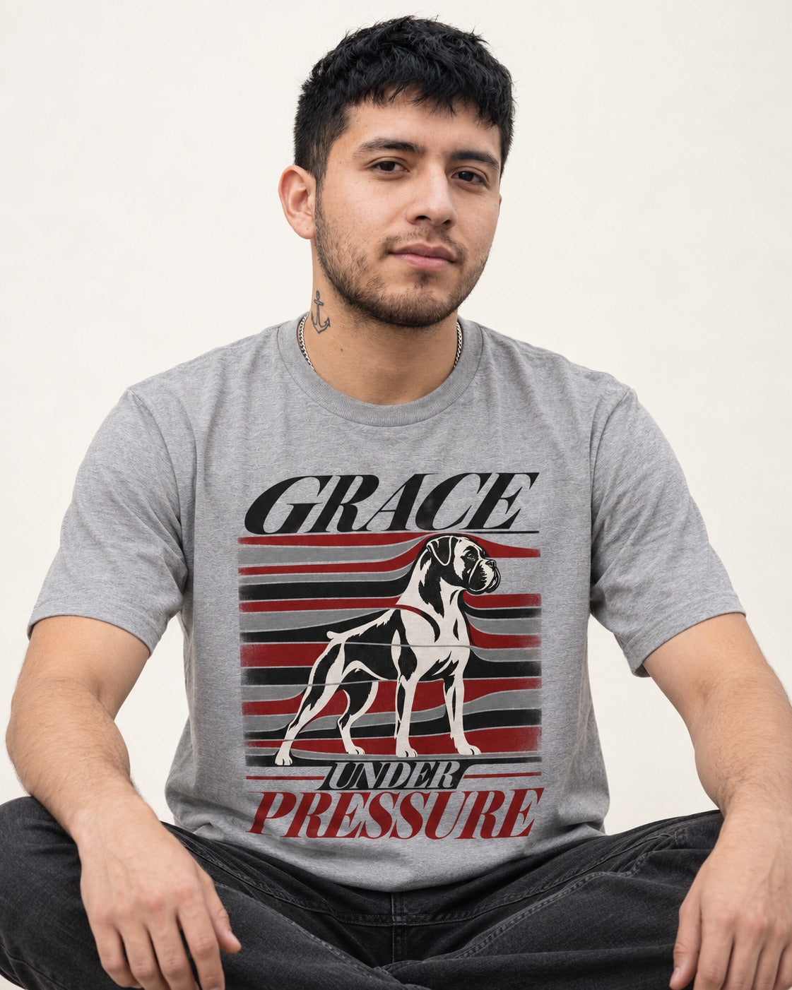 Boxer Grace Under Pressure T-Shirt in Sport Grey, worn by a seated model