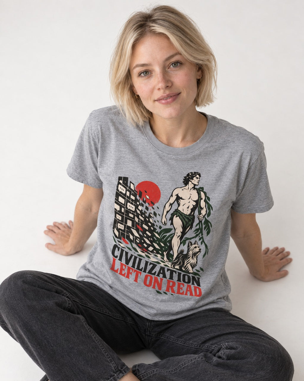 Yorkshire Terrier Left Civilization on Read T-Shirt in Sport Grey, worn by a seated model