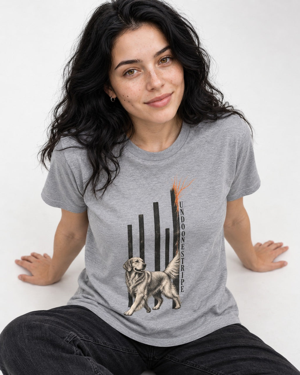 Undo One Stripe Golden Retriever T-Shirt in Sport Grey, worn by a seated model
