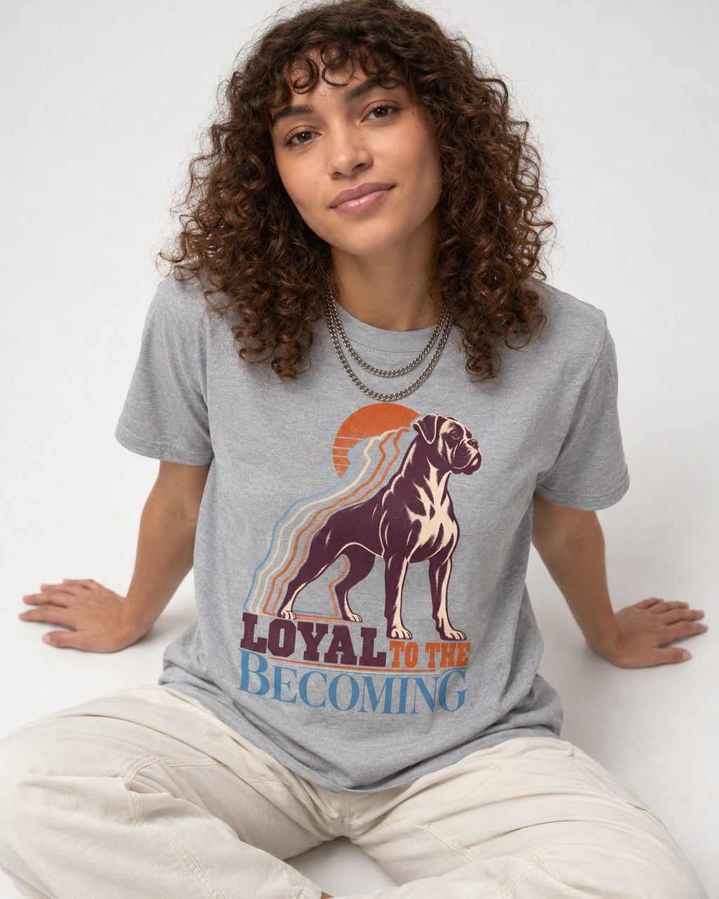 Boxer Loyal to the Becoming T-Shirt in Sport Grey, worn by a seated model