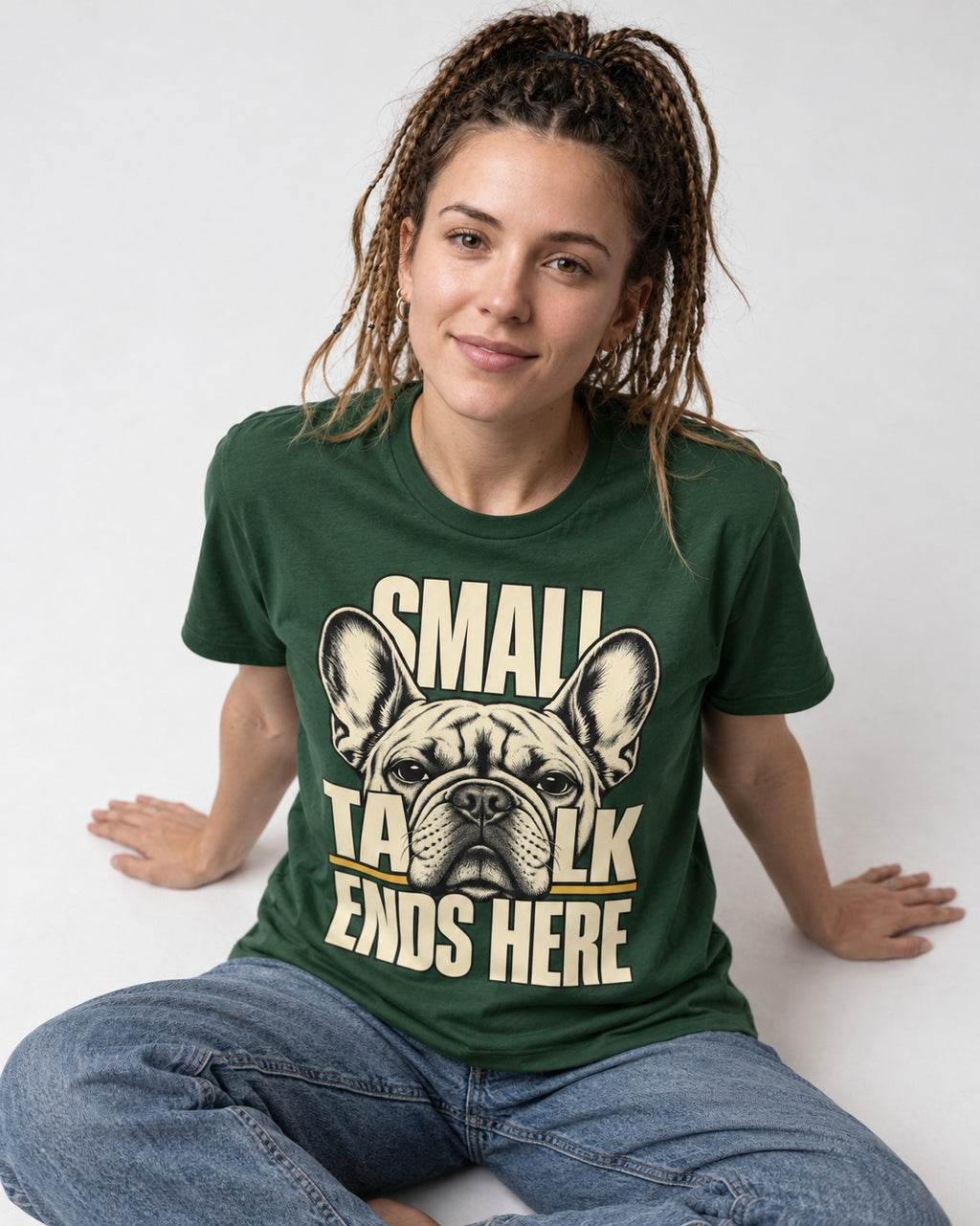 Frenchie Small Talk Ends Here Portrait Graphic T-Shirt in Forest Green, worn by a seated model
