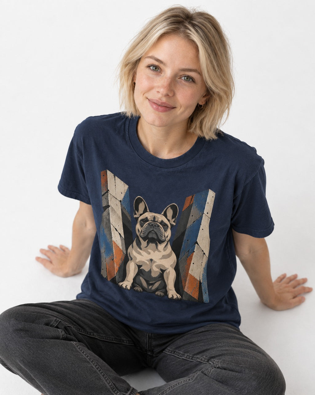 Frenchie Concrete Diplomat Barrier Portrait T-Shirt in Navy, worn by a seated model