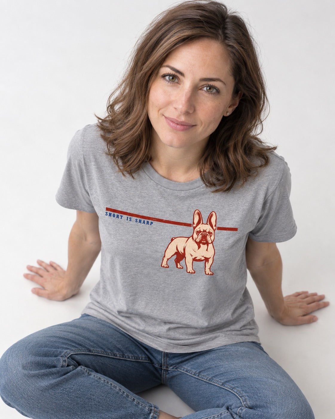Short Is Sharp Frenchie T-Shirt in Sport Grey, worn by a seated model