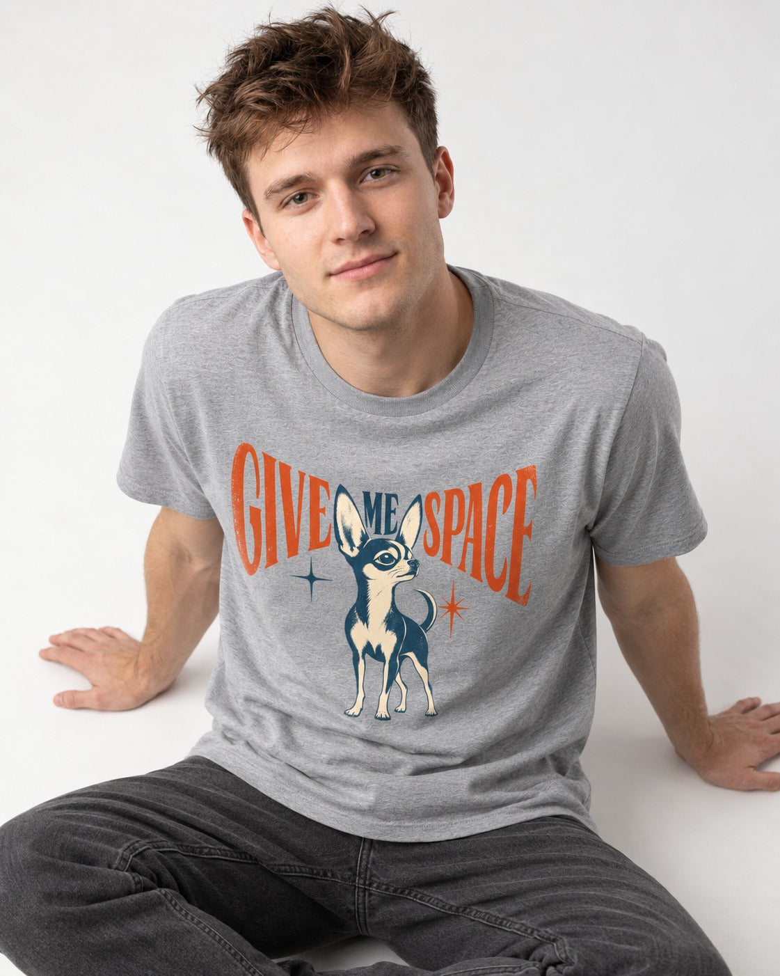 Chihuahua Give Me Space Starburst Graphic T-Shirt in Sport Grey, worn by a seated model