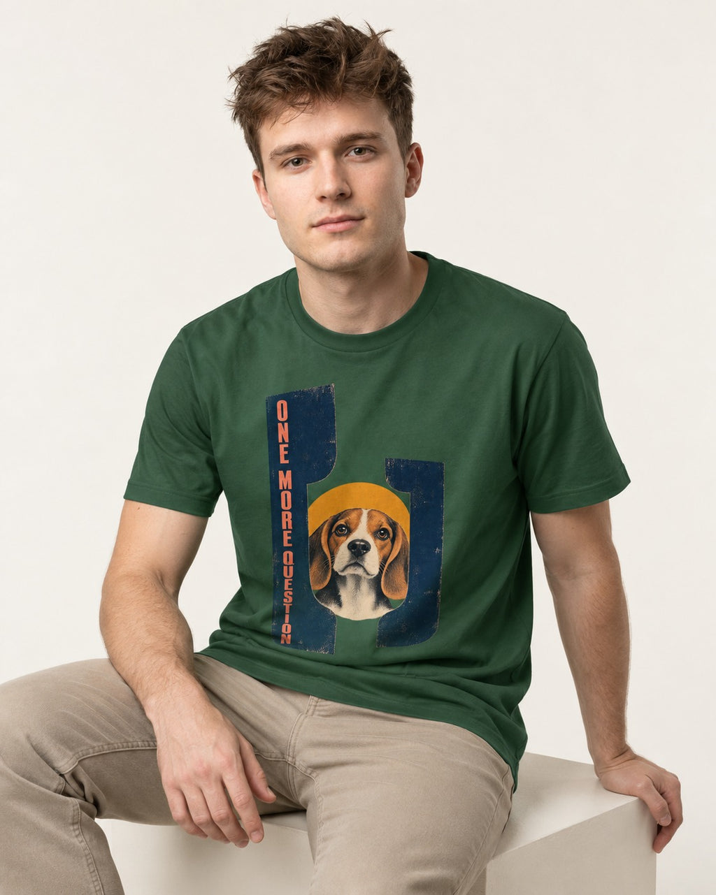 Beagle Has One More Question T-Shirt in Forest Green, worn by a seated model