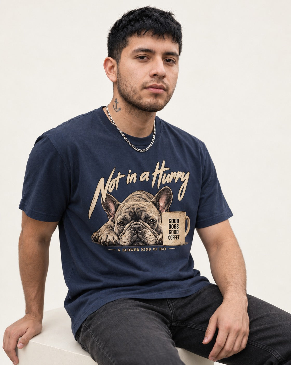 Frenchie Not in a Hurry Coffee Graphic T-Shirt in Navy, worn by a seated model