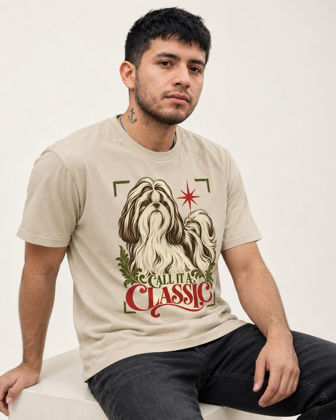 Call It a Shih Tzu Classic T-Shirt in Sand, worn by a seated model