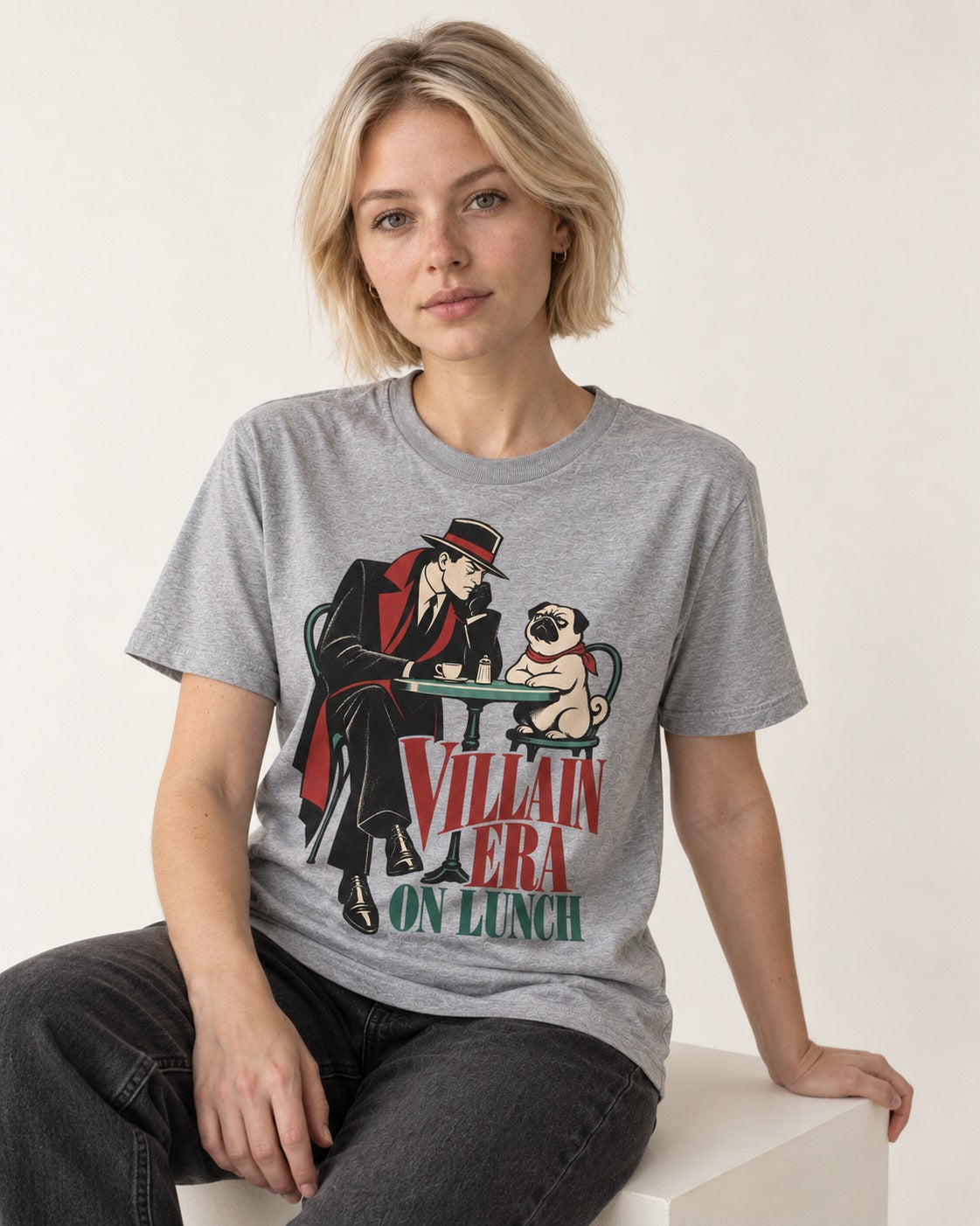 Pug Villain Era T-Shirt in Sport Grey, worn by a seated model