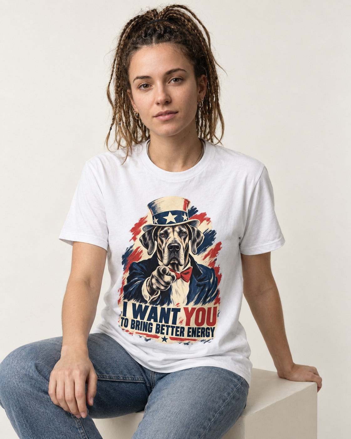 Great Dane I Want You to Bring Better Energy Uncle Sam Graphic T-Shirt in White, worn by a seated model
