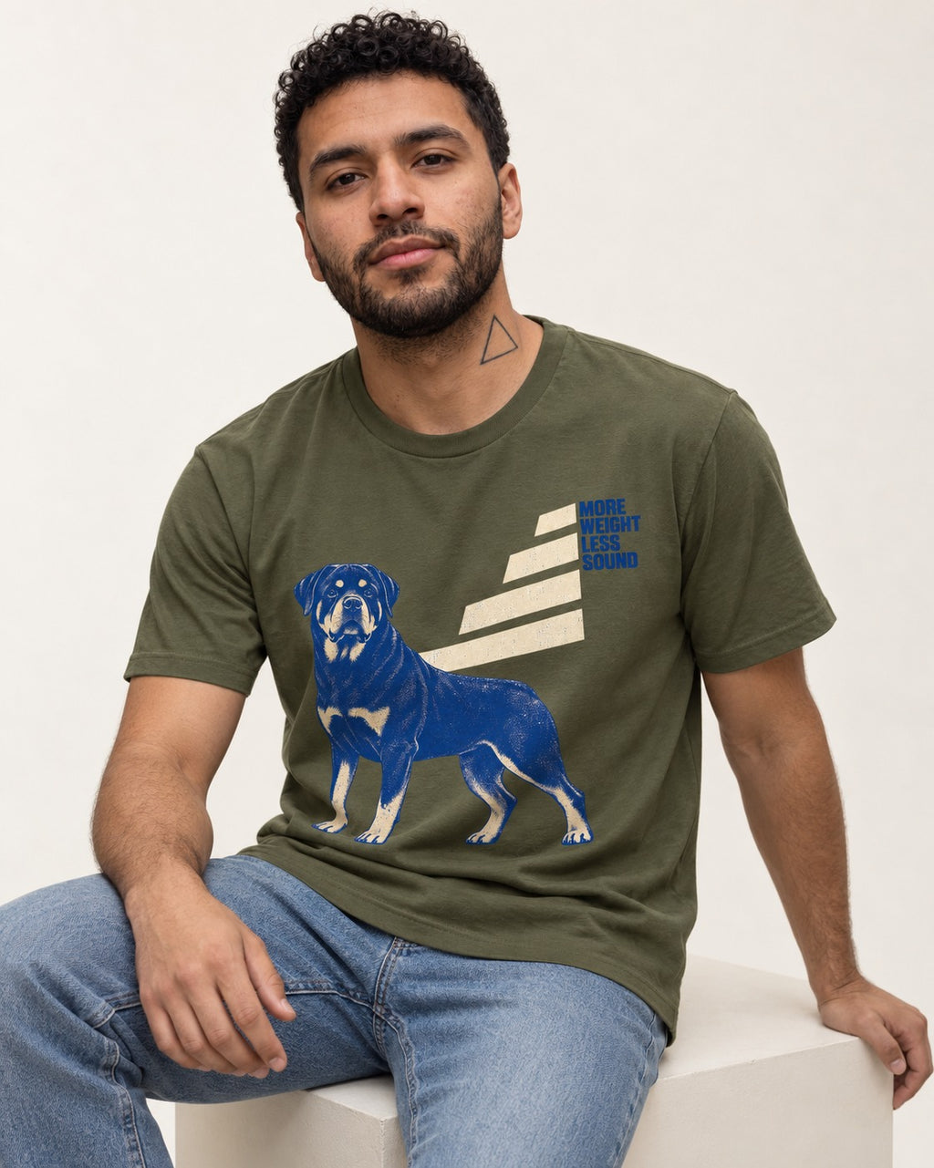 Rottweiler More Weight Less Sound Stair Step Graphic T-Shirt in Heather Military Green, worn by a seated model