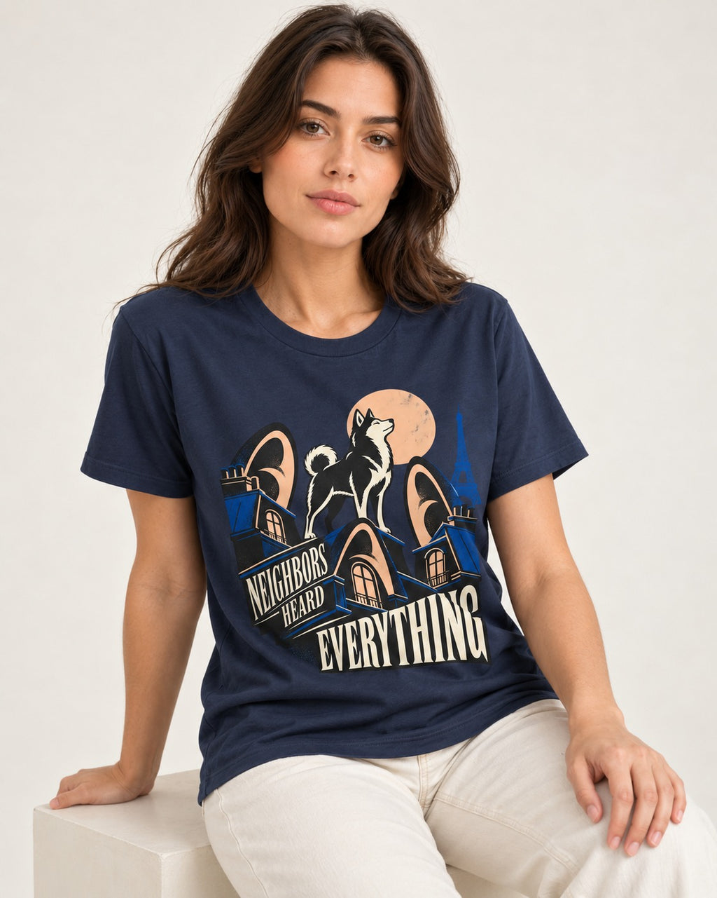 Husky Neighbors Heard Everything Paris Rooftop Graphic T-Shirt in Navy, worn by a seated model