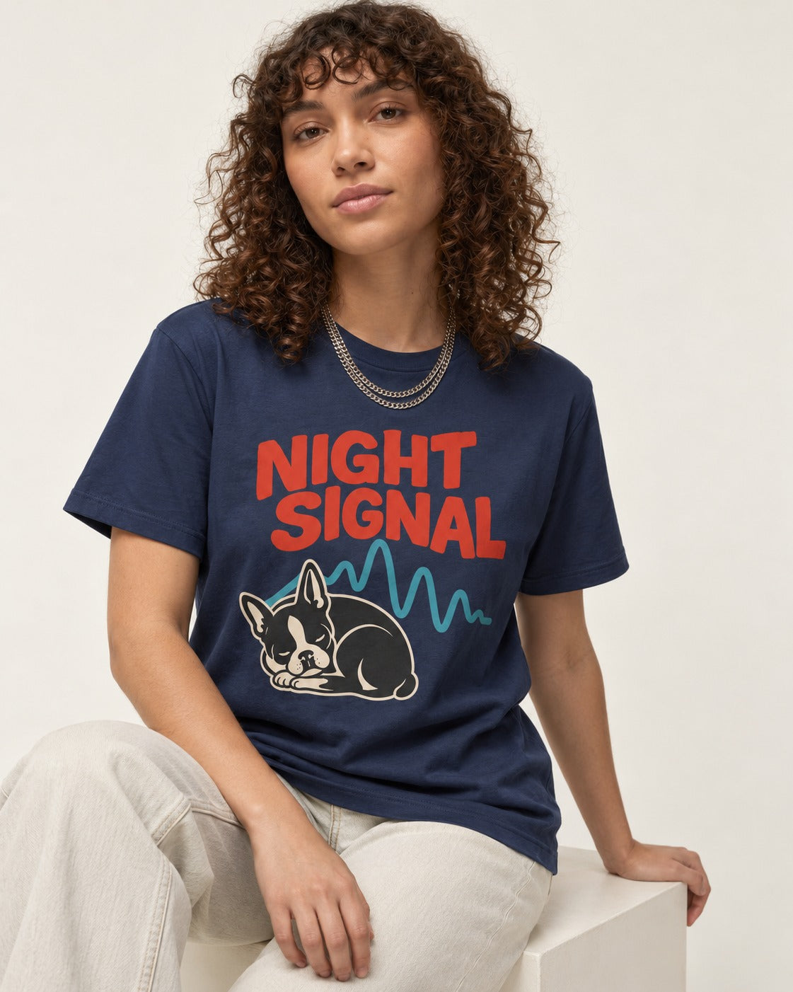 Boston Terrier Sleeping Night Signal T-Shirt in Navy, worn by a seated model
