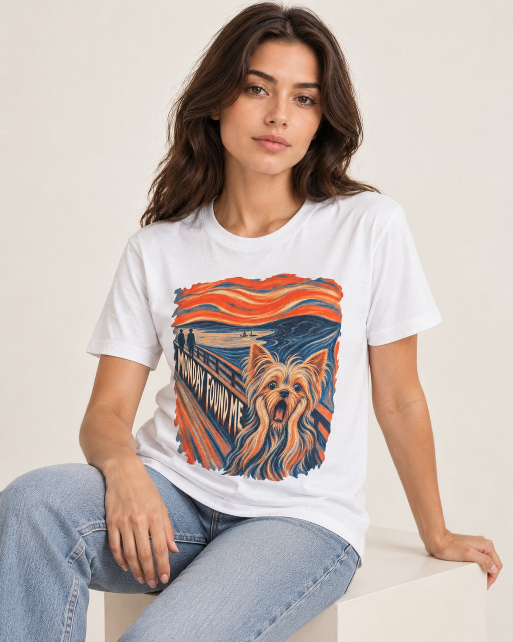 Yorkshire Terrier Monday Found Me Scream Parody Graphic T-Shirt in White, worn by a seated model