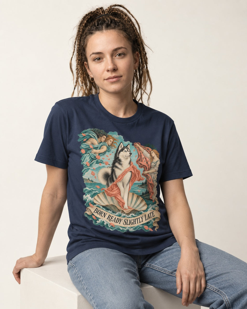 Husky Born Ready Slightly Late Renaissance Graphic T-Shirt in Navy, worn by a seated model
