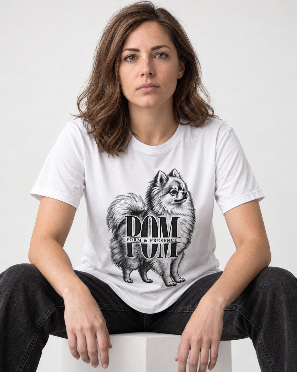 Pomeranian Form and Presence Monogram Graphic T-Shirt in White, worn by a seated model