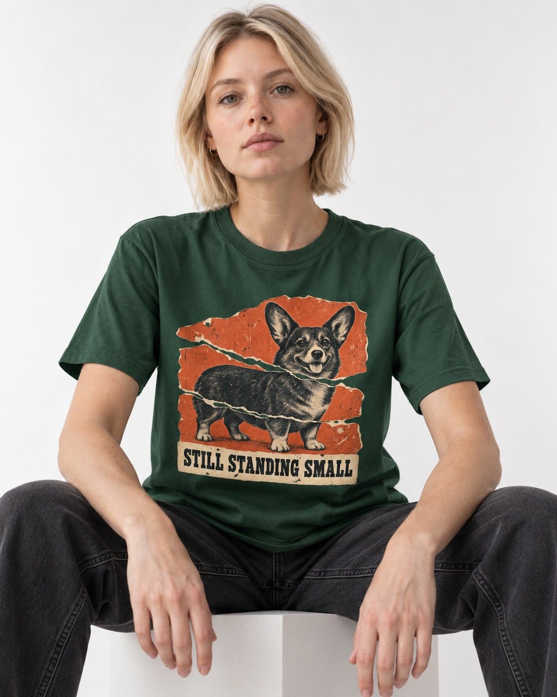 Corgi Still Standing Small Torn Poster T-Shirt in Forest Green, worn by a seated model