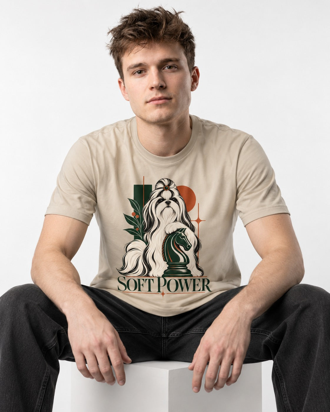 Soft Power Shih Tzu T-Shirt in Sand, worn by a seated model