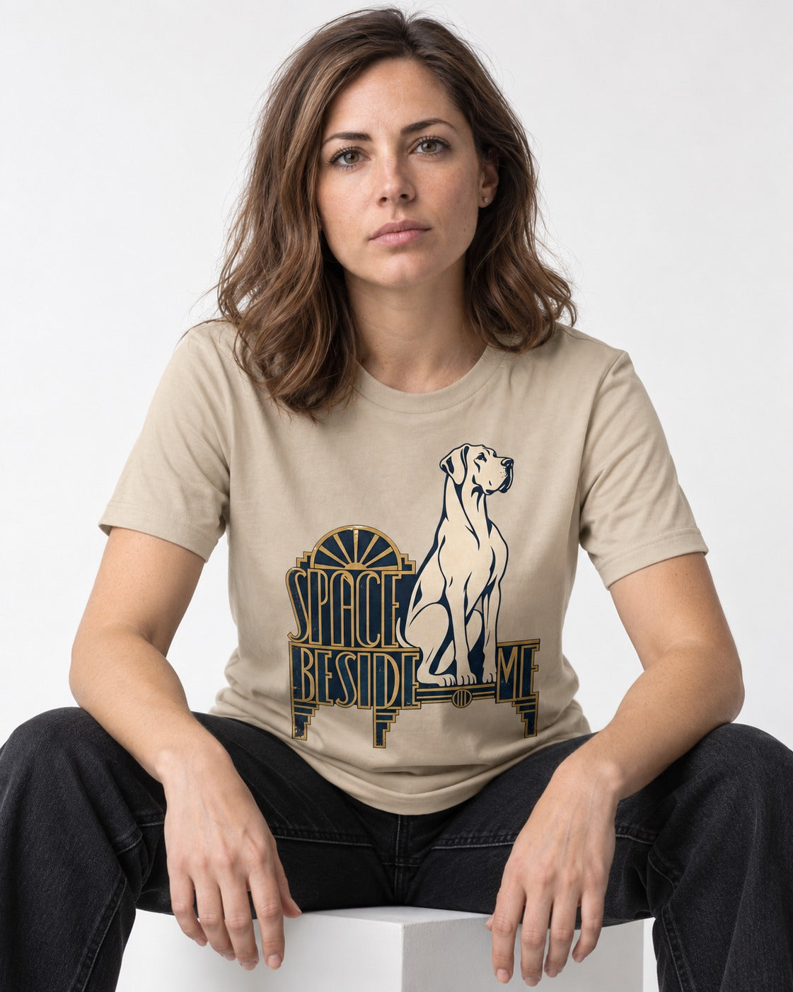 Great Dane's Space Beside Me T-Shirt in Sand, worn by a seated model