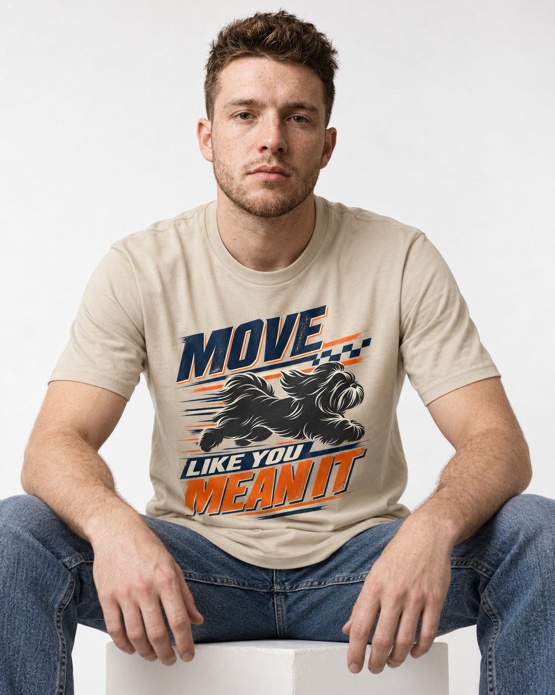 Move and Mean It Shih Tzu T-Shirt in Sand, worn by a seated model