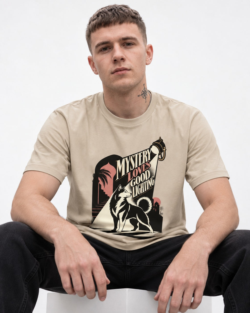 Husky Loves Good Lighting T-Shirt in Sand, worn by a seated model