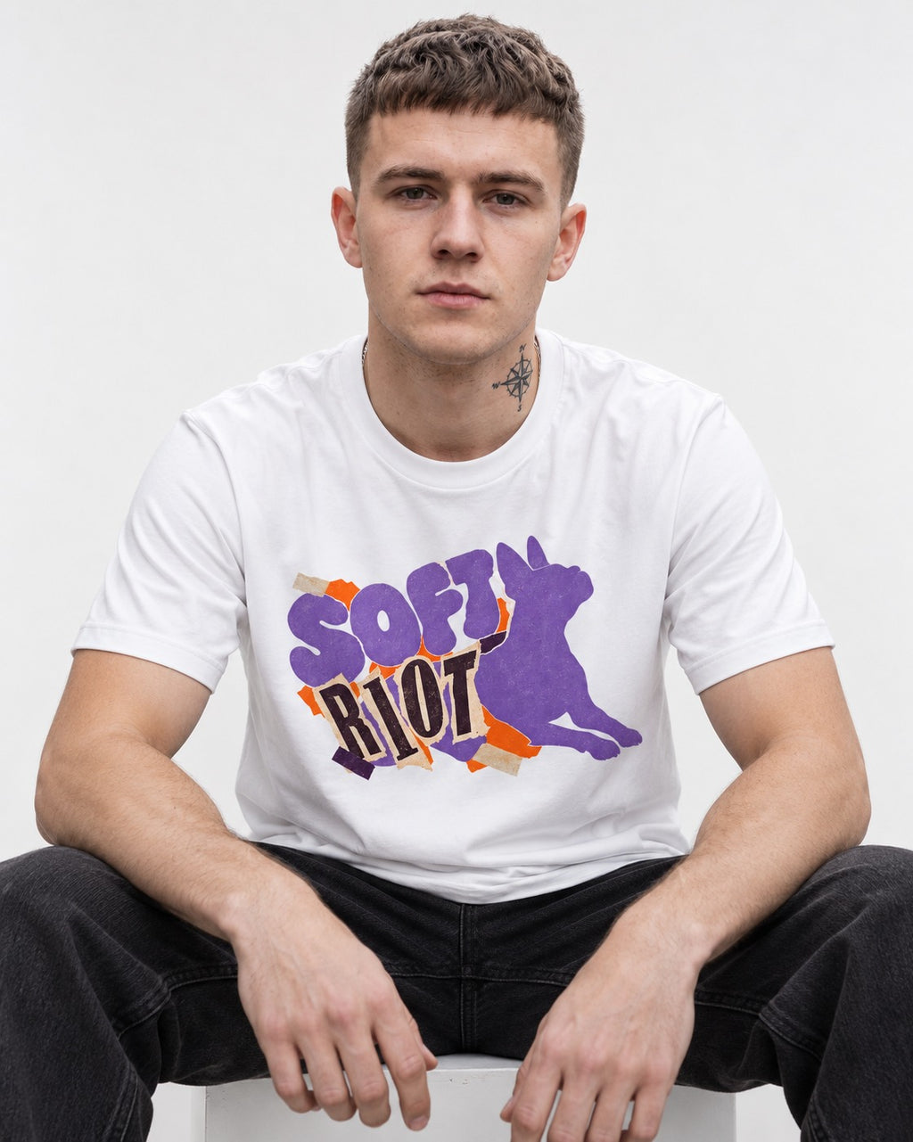 Soft Riot Boston Terrier Graphic T-Shirt in White, worn by a seated model