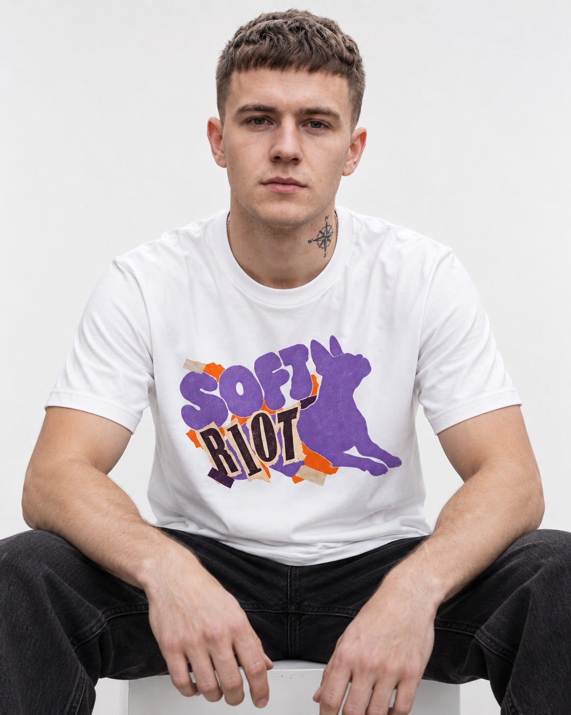 Soft Riot Boston Terrier Graphic T-Shirt in White, worn by a seated model