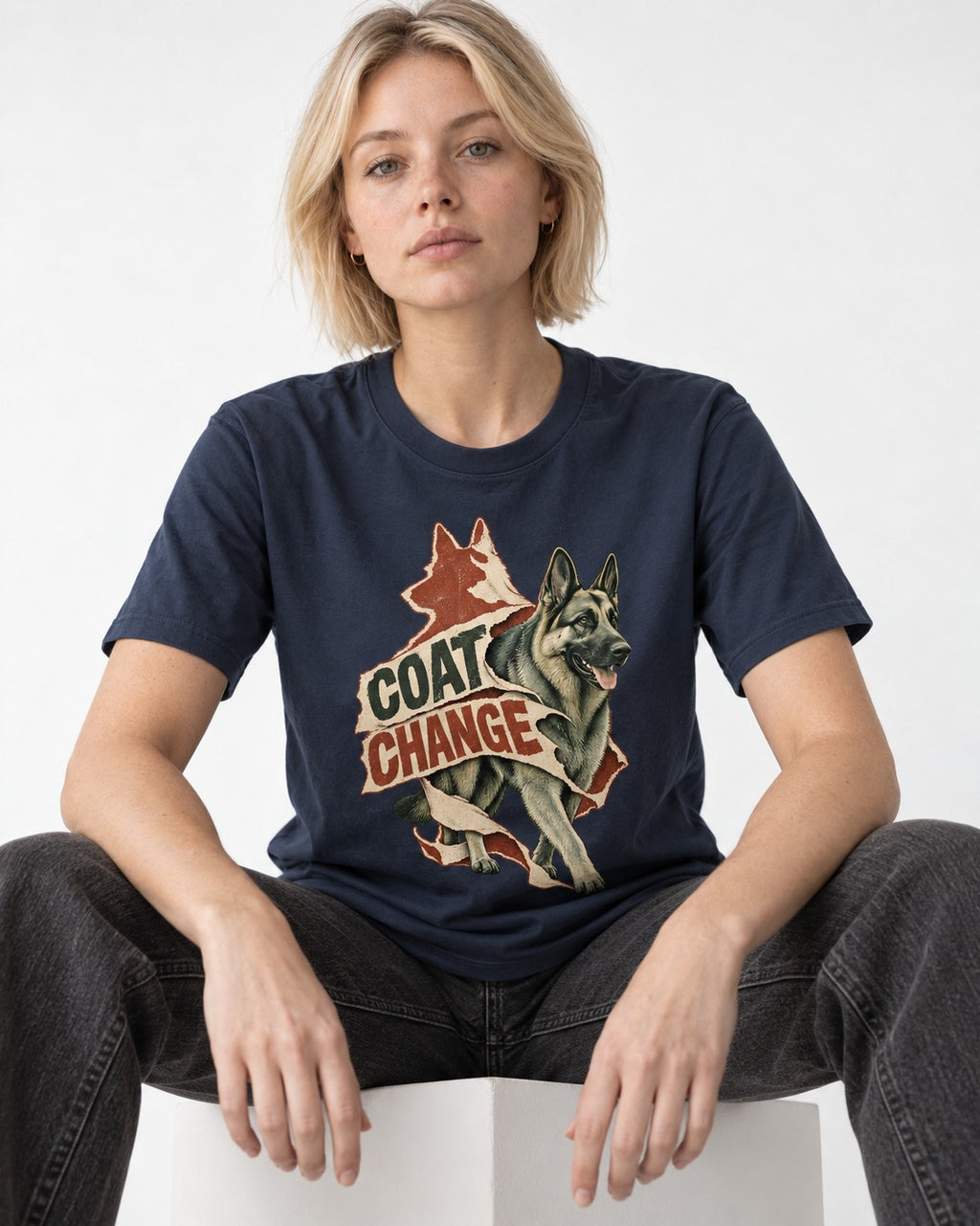 Coat Change Running German Shepherd Dog Ribbon Graphic T-Shirt in Navy, worn by a seated model