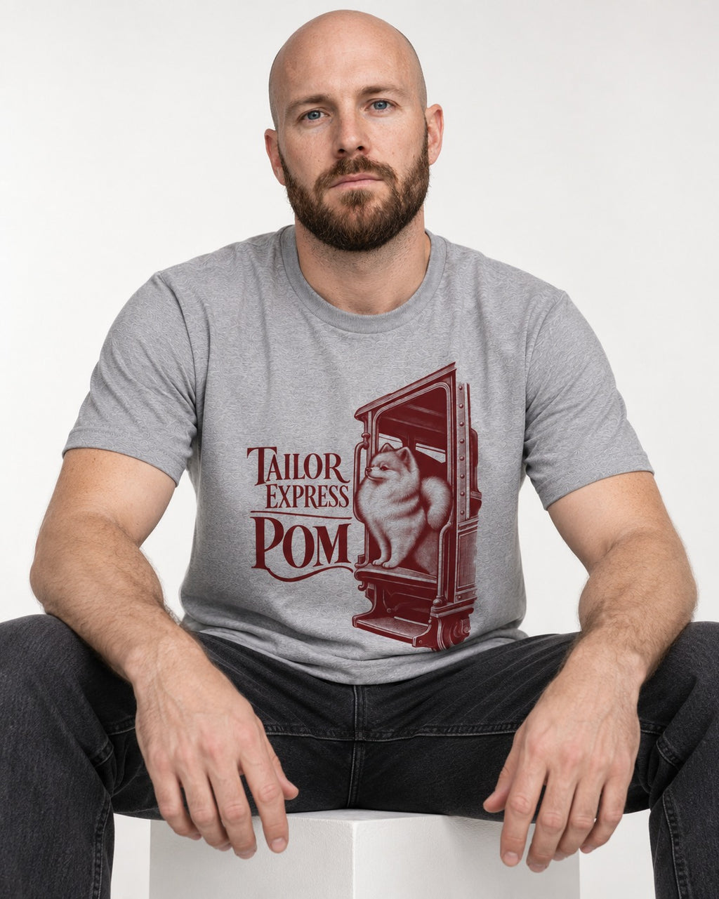 Pomeranian Express T-Shirt in Sport Grey, worn by a seated model
