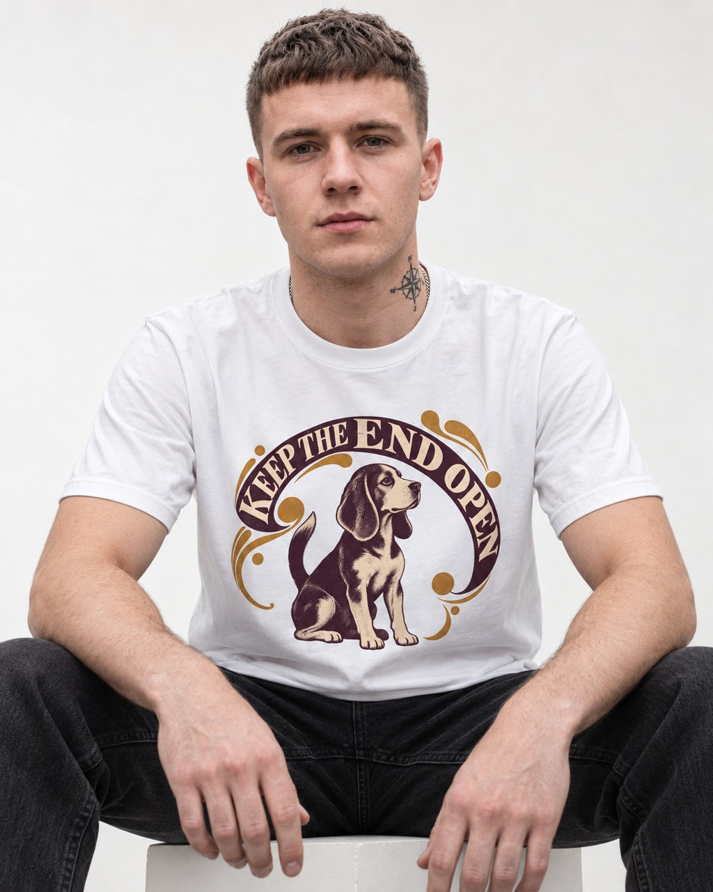 Beagle Keep The End Open Ornamental Graphic T-Shirt in White, worn by a seated model