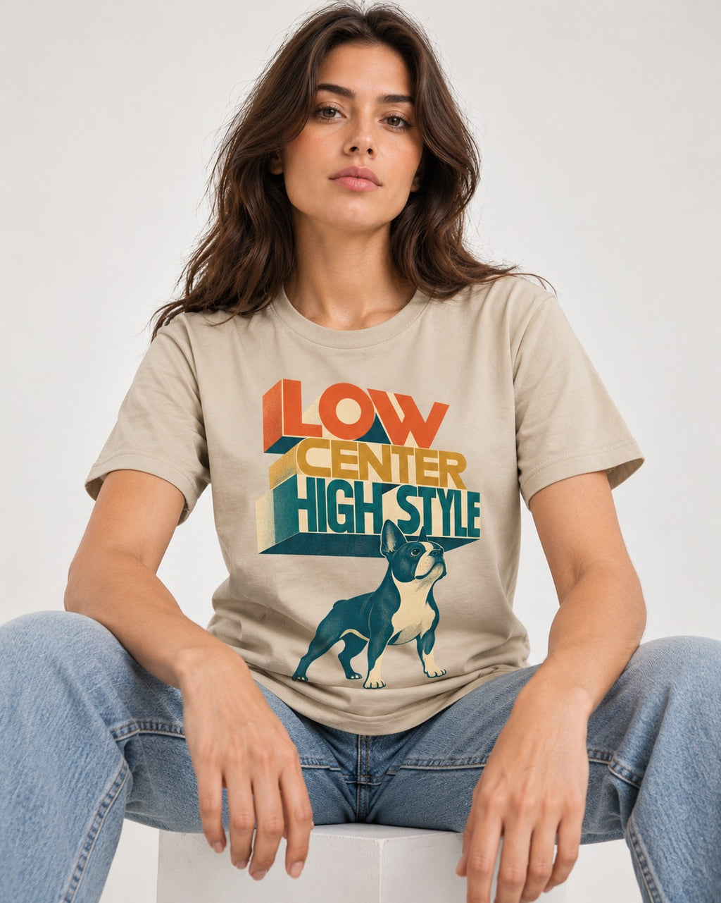 Low Center Boston Terrier T-Shirt in Sand, worn by a seated model