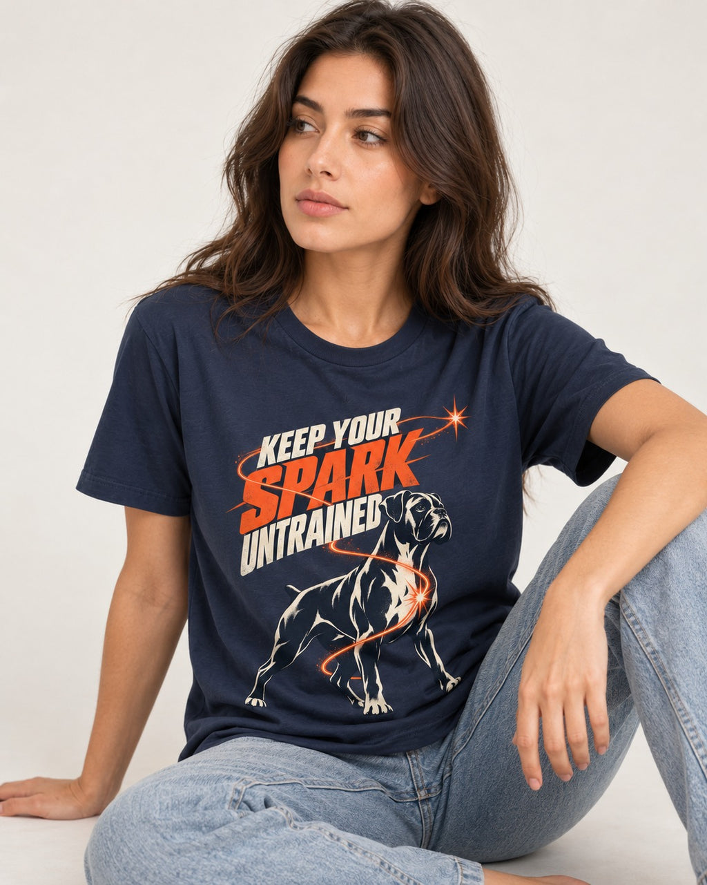 Boxer Keep Your Spark Untrained T-Shirt in Navy, worn by a seated model