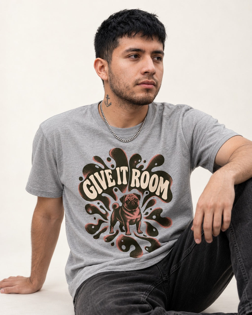 Give Pug Room T-Shirt in Sport Grey, worn by a seated model