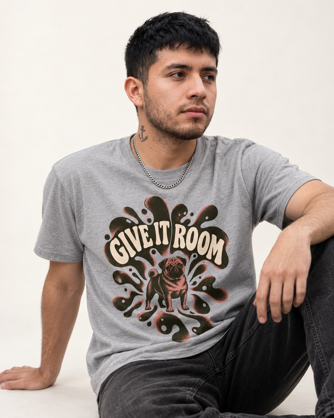 Give Pug Room T-Shirt in Sport Grey, worn by a seated model