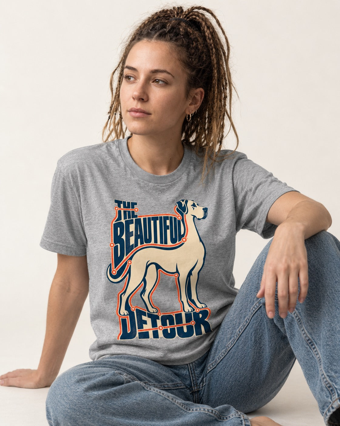 Great Dane's Beautiful Detour T-Shirt in Sport Grey, worn by a seated model